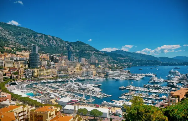 Panoramic view of Monaco’s coastline with luxury buildings and harbor