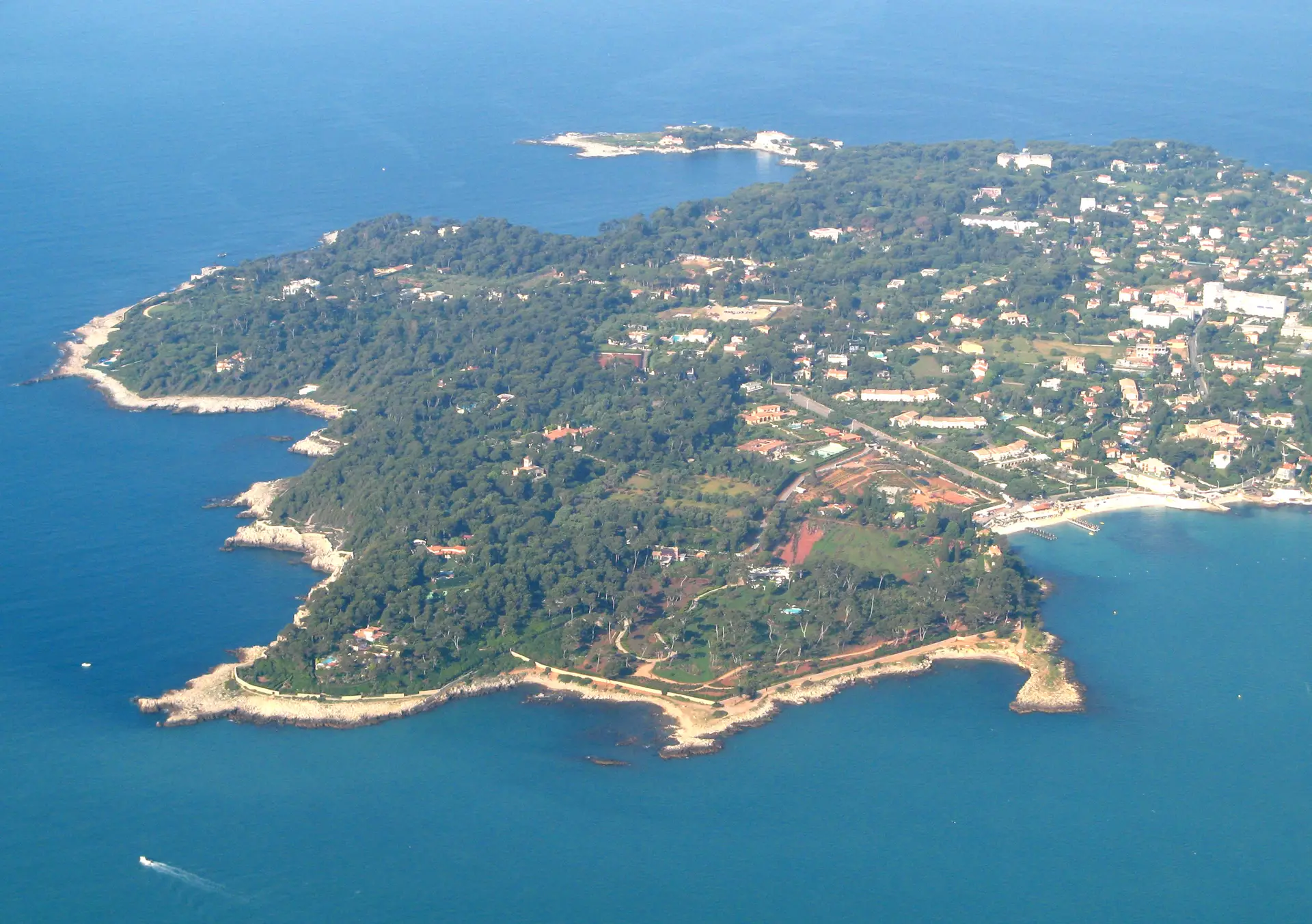 Scenic Aerial of Cap d’Antibes Aerial view of Cap d’Antibes peninsula surrounded by sea