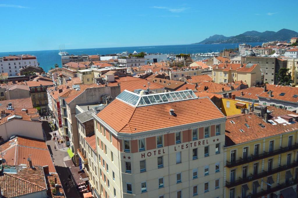 Central Hôtel L’Esterel Cannes with rooftop terrace Panoramic view of Hôtel L’Esterel with sea in background