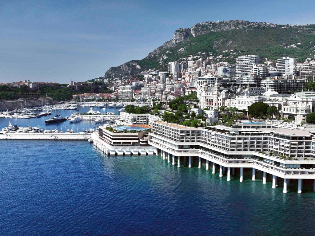 Harbor view from Fairmont Monte Carlo hotel with rooftop pool