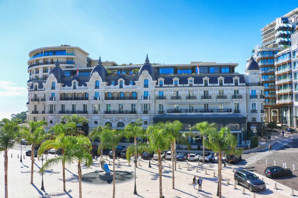 Luxury Hôtel de Paris Monte Carlo – Monaco Top 10 Luxury Hotels on the French Riviera - 5-Star Retreats, Hôtel de Paris in Monaco, exterior view with palm trees and classic façade
