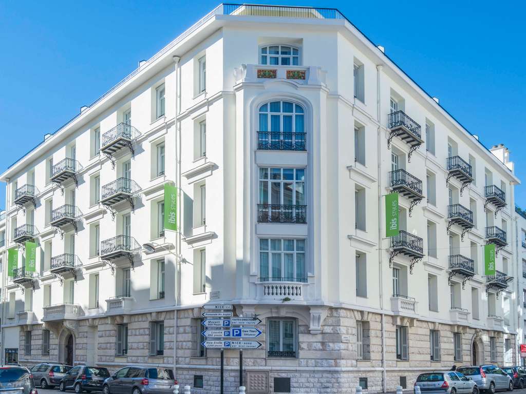 Ibis Styles Centre Gare – Budget hotel in central Nice with family appeal Bright white exterior of Ibis Styles Nice Centre Gare with green signage