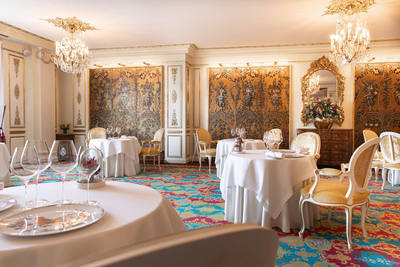 Two Michelin-starred French haute cuisine at Le Chantecler in Hotel Negresco, Nice Opulent dining room of Le Chantecler with chandeliers and luxurious decor