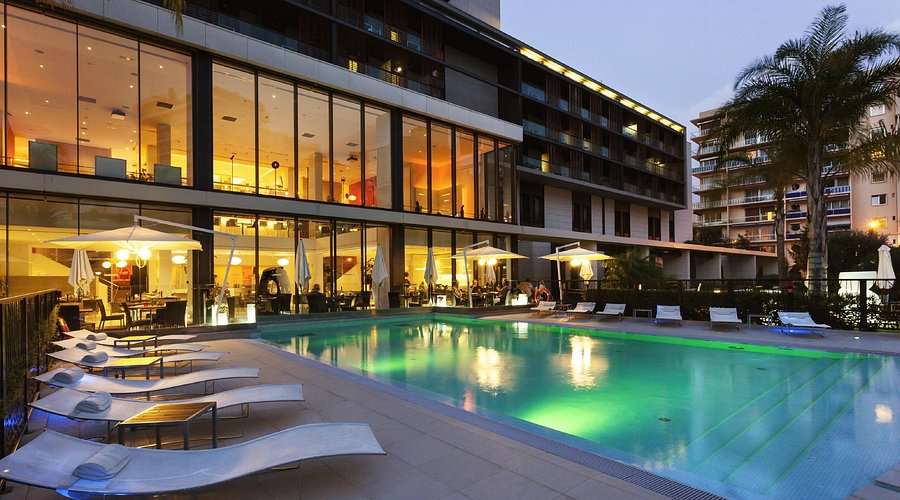 Modern Novotel Monte Carlo with pool and garden setting