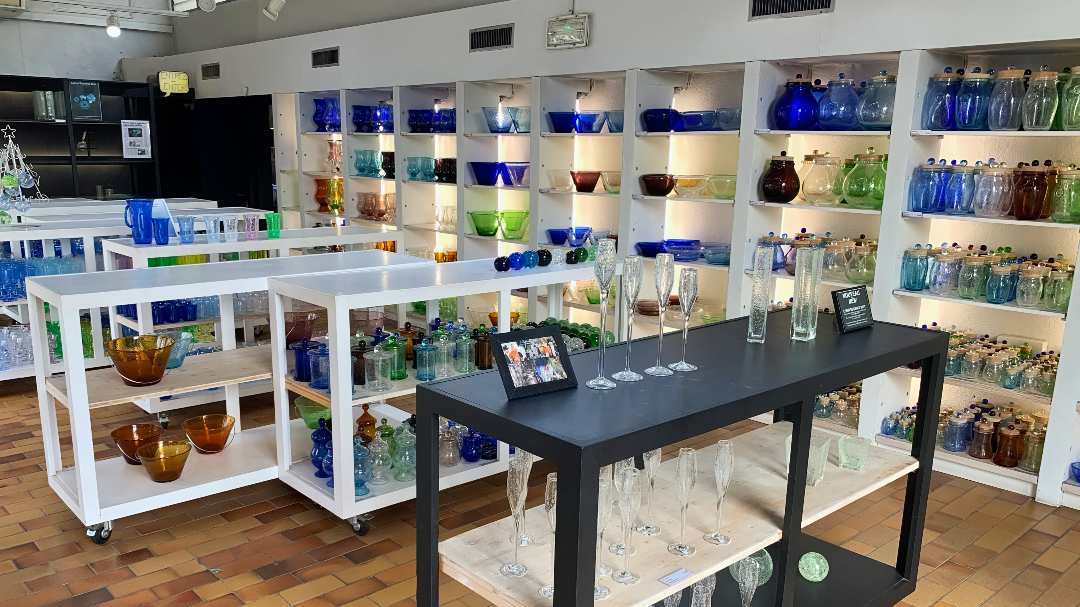 Watch and Shop Glassblowing Art in Biot Colorful hand-blown glassware on display in Biot’s artisan glass shop