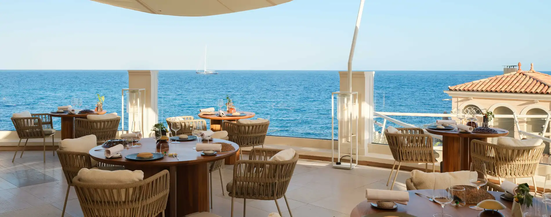 Blue Bay Restaurant in Monaco – Seaside Fine Dining by Chef Marcel Ravin Terrace tables at Blue Bay restaurant overlooking the Mediterranean in Monaco