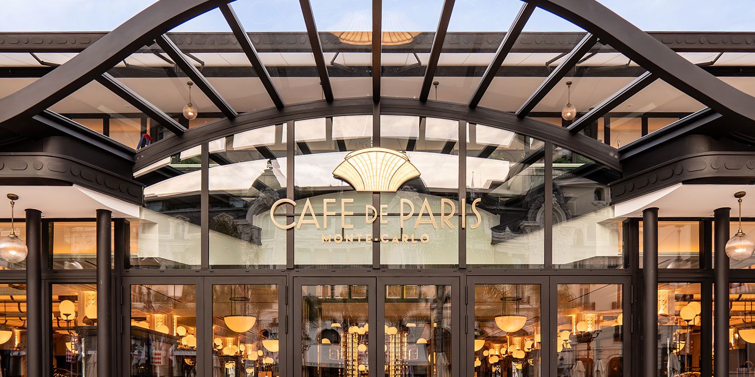 Café de Paris Monaco – Iconic Brasserie on Casino Square Front entrance of Café de Paris with art deco signage in Monte Carlo