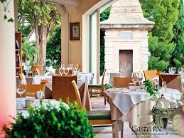 Castelroc Restaurant Monaco – Authentic Monegasque Dining Near the Palace Elegant outdoor terrace of Castelroc restaurant beside the Prince’s Palace