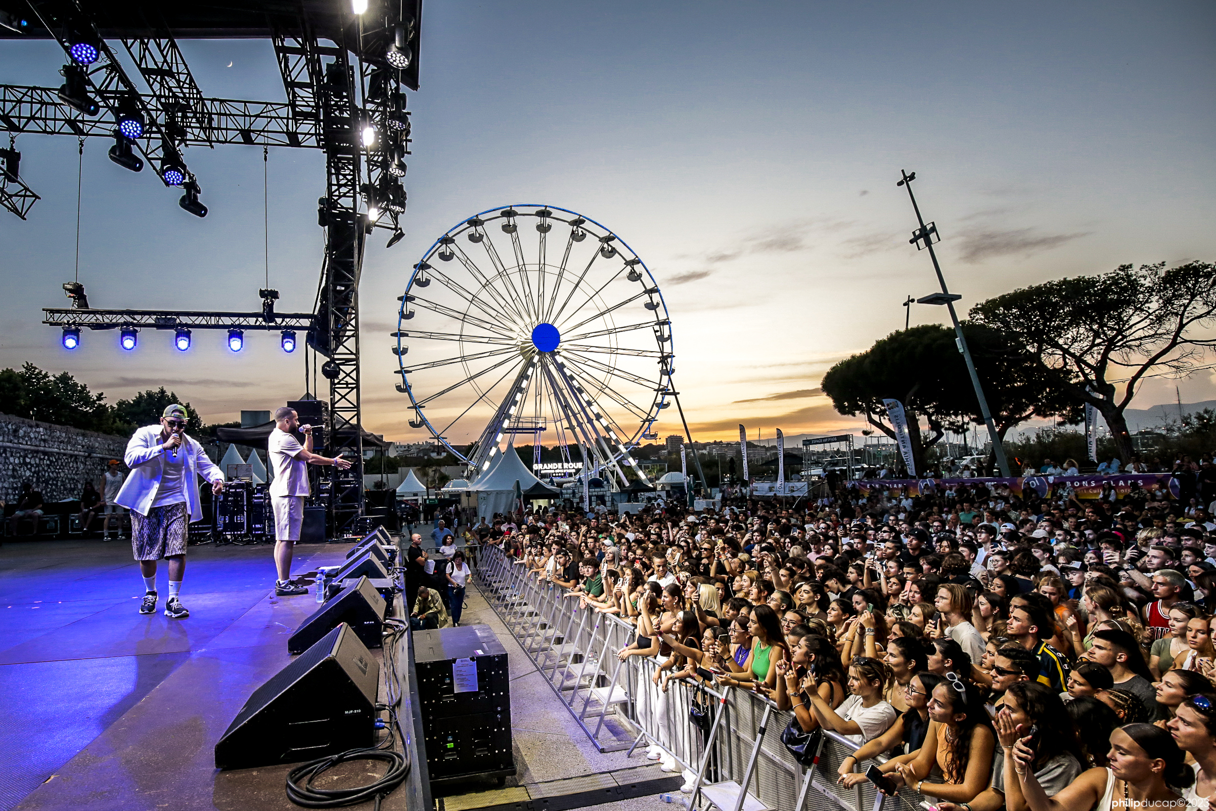 Festival Les Nuits Carrées – Antibes’ unmissable summer concert series Nighttime music festival with crowd and artists performing on stage in Antibes