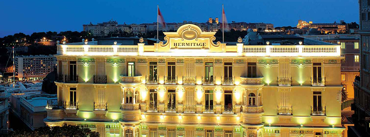 Elegant Façade of Hotel Hermitage Monte-Carlo by Night Hotel Hermitage Monte-Carlo beautifully lit at night in Monaco
