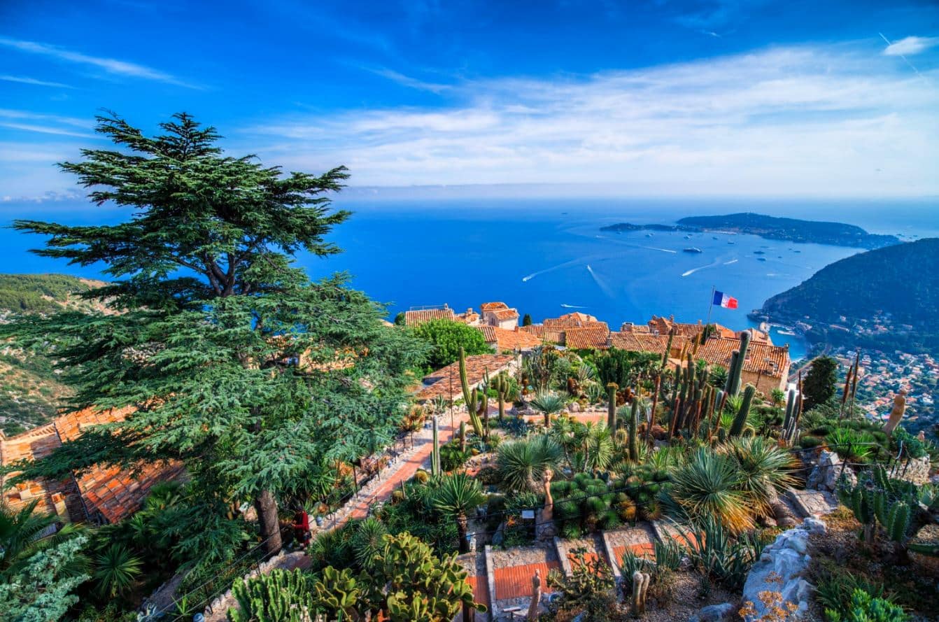 Clifftop garden in Èze with panoramic views and artistic landscaping Sculptures and cacti overlooking the coast at Jardin Exotique