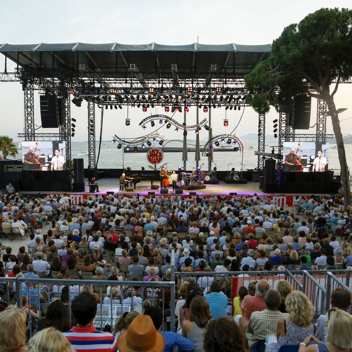 Romantic jazz nights under the stars Crowds enjoying seaside jazz concerts at Jazz à Juan