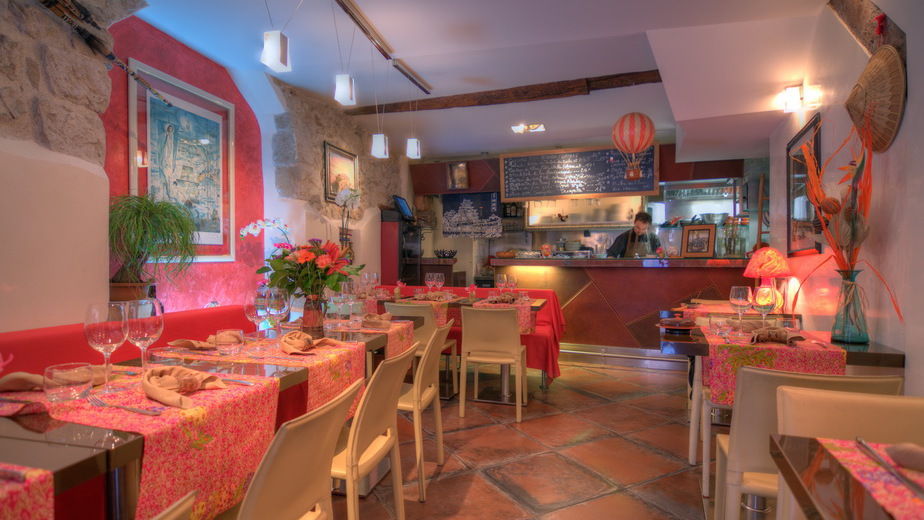 La Montgolfière Monaco – Romantic French Dining in the Old Town Intimate dining room with red decor at La Montgolfière in Monaco-Ville