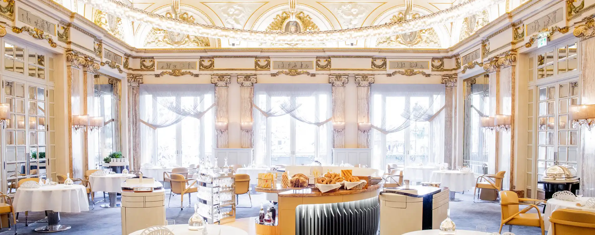 Fine Dining at Le Louis XV – Alain Ducasse, Monaco Elegant interior of Le Louis XV – Alain Ducasse restaurant in Monaco