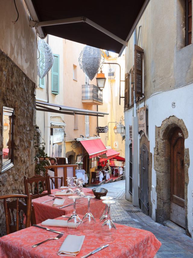 Le Suquet – medieval lanes and bay views Le Suquet hill with church and views over Cannes bay