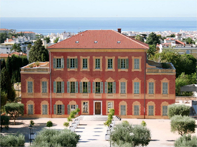 Matisse Museum in Nice – Explore the Life and Work of Henri Matisse Exterior of the Matisse Museum with classic red Mediterranean architecture in Nice.